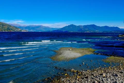 View of Lake Maggiore the second largest lake in Italy, windy day with waves Stock Photos