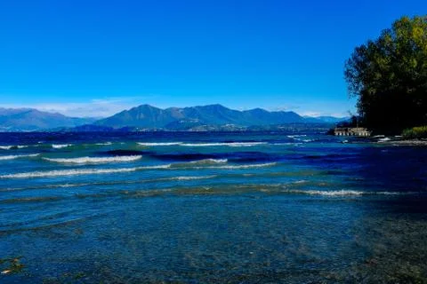 View of Lake Maggiore the second largest lake in Italy, windy day with waves Stock Photos