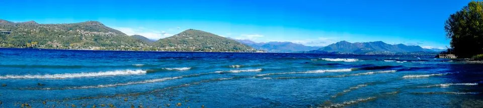 View of Lake Maggiore the second largest lake in Italy, windy day with waves Stock Photos