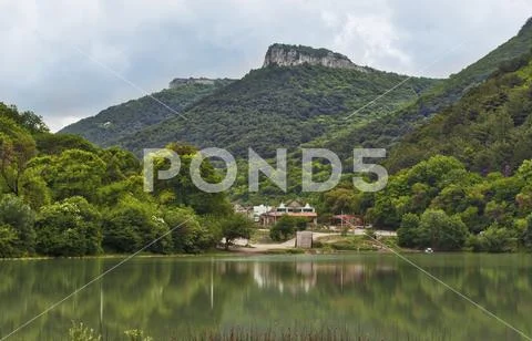 View from the lake to Mangup Kale mountain, Ukraine, Crimea Stock Photos
