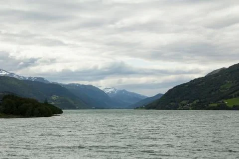 View of a lake with mountain in background Stock Photos