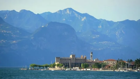 View of the Lake, the Old Town with the Castle and the Mountain Ranges Behind Stock Footage 167448640