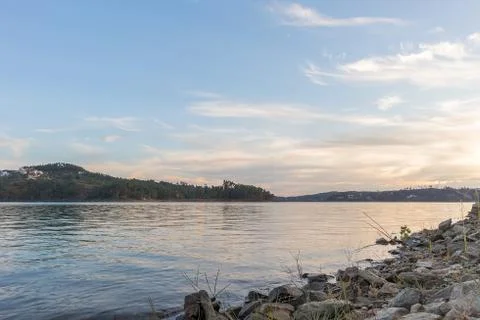 View of lake with sunset algae and stones. Serra de Tomar. Portugal Stock Photos