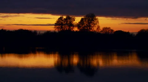 View of lake at sunset Stock Footage 57815559