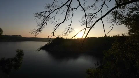 View of the lake from the top of the cliffs in the early morning Stock Footage 251463992