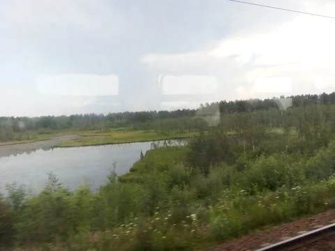View of the lake from the train window Stock Photos