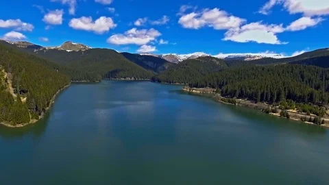 View from the lakeside at the foothills of the Bucegi mountain range Stock-Footage 75936822