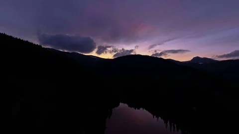 View from the lakeside at the foothills of the Bucegi mountain range Stock-Footage 75944968