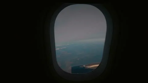 View of the land from a plane window in air on black backround. Stock Footage 296375907