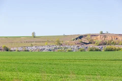 A view of the landfill. Garbage dump. A pile of plastic rubbish, food waste.. Stock Photos