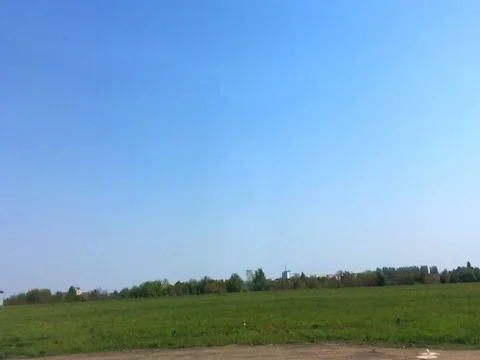 View on landscape of fields and river from window of flying plane Stock Footage 76769215