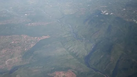 View of landscape, forest and river from airplane, Kerala, India, FullHD 1080p Stock Footage 138681487