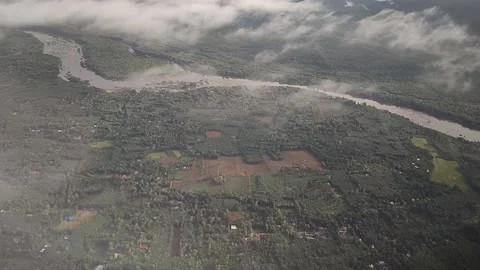 View of landscape, forest and river from airplane, Kerala, India, FullHD 1080p Stock Footage 138685041
