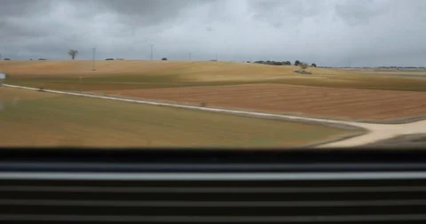 View of a landscape from the window of a train Stock Footage 104077494