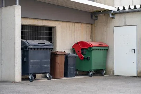 View of large and small plastic containers for various types of garbage Stock Photos