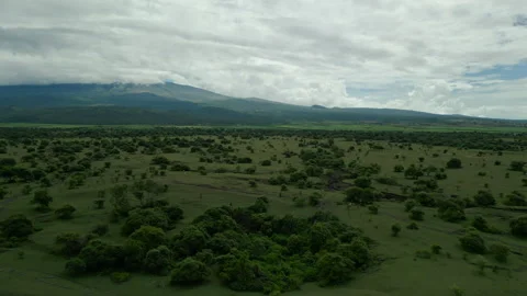 View of the large caldera of Mount Tambora under the clouds. Sumbawa, Indonesia Stock Footage 277197445