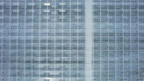 View of large geometrical modern construction of vegetables greenhouse. Vie.. Video stock 245399040