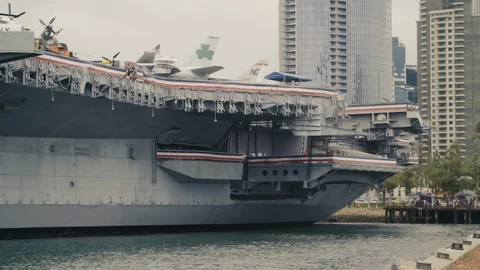 View of the large hull of the historic World War Two Aircraft Carrier USS Midway Stock Footage 112960387