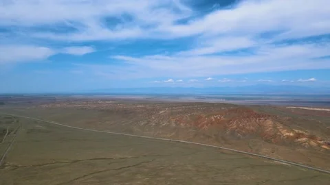 View of a large mountain valley crossed by a highway Video stock 237903076