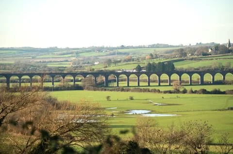 A view of the large railway viaduct with multiple arches near Harringworth Stock Photos