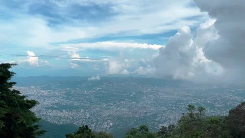 View of a large urban valley under a spectacular cloudy sky, Caracas, Venezuela Stock Footage 326831167