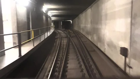 A view from the last cab of a driverless subway train traveling through a subway Stock Footage 273178147