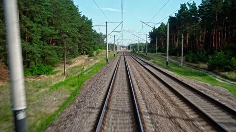 View from the last carriage of a running train through the forest Stock Footage 160067899