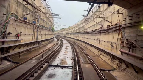 The view from the last coach of a driverless metro train Stock Footage 343196099