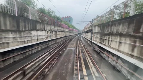The view from the last coach of a driverless metro train Stock Footage 343196216