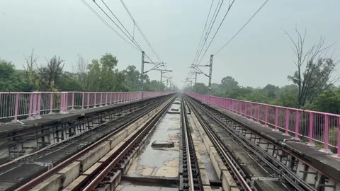The view from the last coach of a driverless metro train Stock Footage 343196319