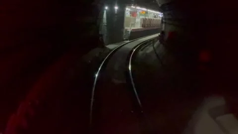 The view from the last coach of a driverless metro train Stock Footage 343196332