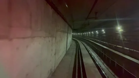 The view from the last coach of a driverless metro train Stock Footage 343196463