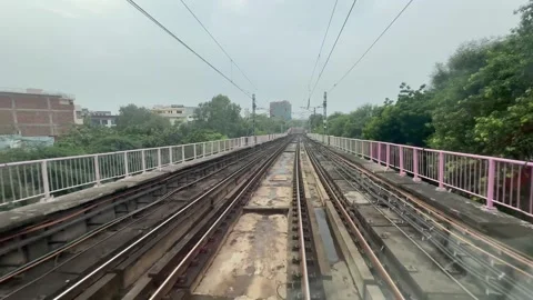 The view from the last coach of a driverless metro train Stock Footage 343197035