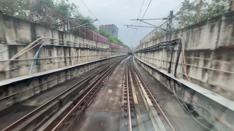 The view from the last coach of a driverless metro train Stock Footage 343197069