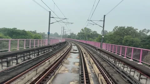The view from the last coach of a driverless metro train Stock Footage 343197079