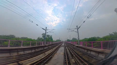 The view from the last coach of a driverless metro train Stock Footage 343197477
