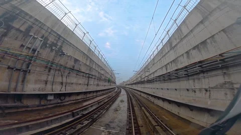 The view from the last coach of a driverless metro train Stock Footage 343197600
