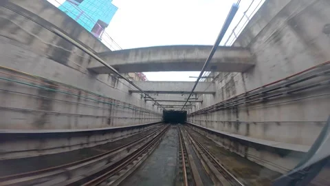 The view from the last coach of a driverless metro train Stock Footage 343197665