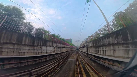 The view from the last coach of a driverless metro train Stock Footage 343197676