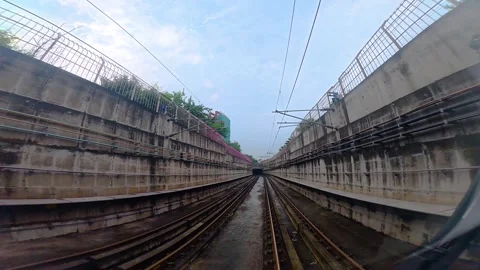 The view from the last coach of a driverless metro train Stock Footage 343198304
