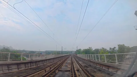 The view from the last coach of a driverless metro train Stock Footage 343199496