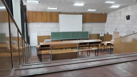 View from the last desk to the blackboard in empty lecture hall Stock Footage 127154959