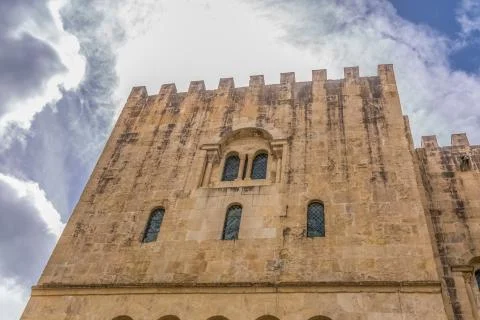 View of lateral facade of the gothic building of Coimbra Cathedral Stock Photos