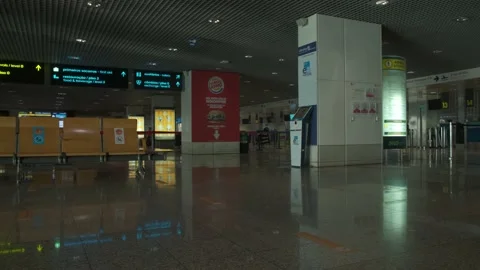 View from left to right of an airport lounge beside a baggage check in Stock Footage 166889137