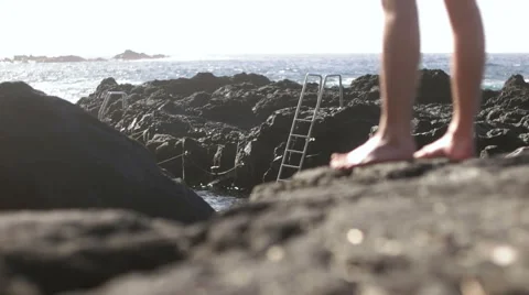 View of legs walking into the shot towards creek Stock Footage 59337345