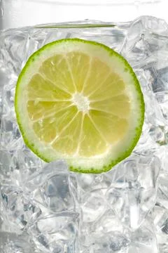 View of lemon slice in ice cubes Stock Photos