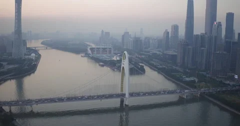 View of Liede bridge with traffic and Guangzhou central buildings district Vídeos de archivo 148800362