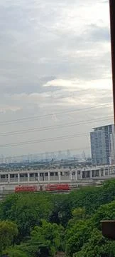 View of light railways train on cloudy afternoon Stock Photos