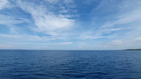 View of light reflection between clouds above the sea Video stock 297241462