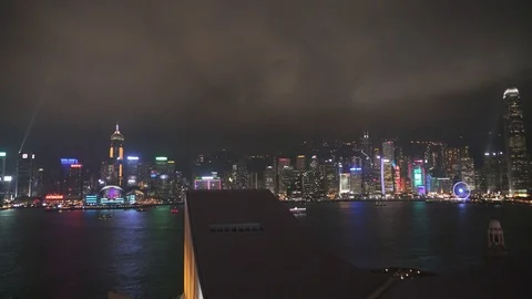 View of the light show on a busy night featuring the skyline of Hong Kong. Stock Footage 118797556